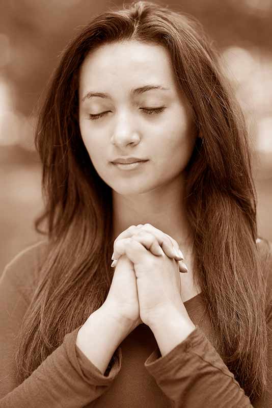 Young lady praying
